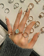 Load image into Gallery viewer, SMALL CIRCLE PAVE NINE RING
