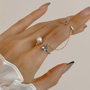 KAIA OVAL CHAINED DBL RINGS